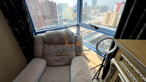 Furnished two-bedroom apartment with a living room for annual rent, with a fully open view.