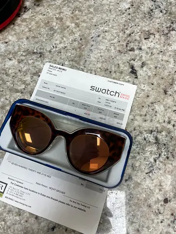Swatch tortoiseshell sunglasses with case