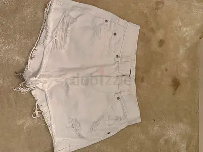 White distressed denim shorts - size 34, gently used