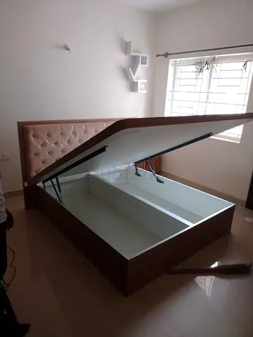 Queen storage bed with hydraulic lift and tufted headboard