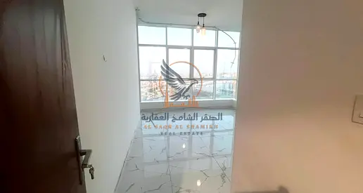 غرفتين وصالة للإيجار السنوي في أبراج الواحة –عجمان  إطلالة بحرية | 2 بلكونة | جيم ومسبح