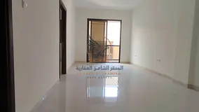 Brand new 1BR apartment for annual rent with central AC 2 baths balcony spacious layout prime locati