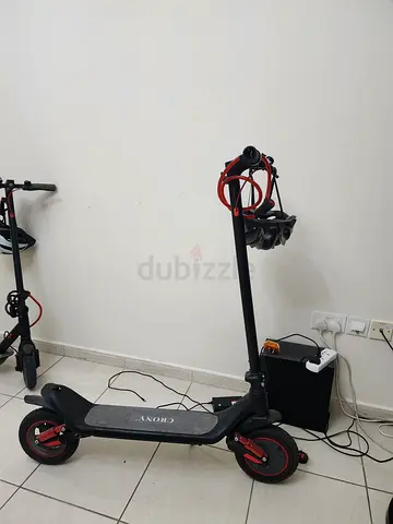 Used electric scooter — dual scooters, good condition