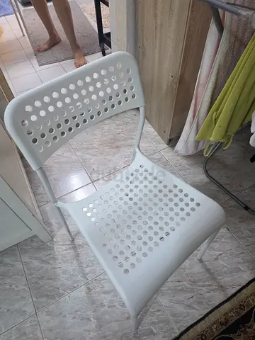 2 Ikea White plastic chairs - good condition
