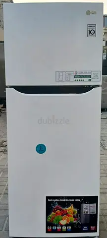 Double door LG Refrigerator , good working condition. Color gray.