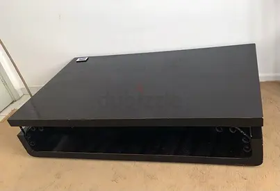 Low black rectangular coffee table (modern, sturdy)