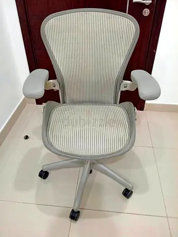 Herman miller grey Ergonomic mesh office chair — adjustable armrests, good condition
