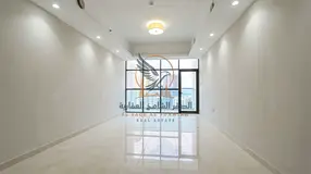 One-bedroom apartment with a living room, balcony, and open view. Includes parking, built-in wardrob