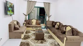 Two-bedroom apartment with a living room, furnished with clean furniture, in Ajman, Al Rashidiya 2,