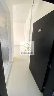 Spacious studio, first-time occupancy, with a separate kitchen, located in Al Rashidiya 2.