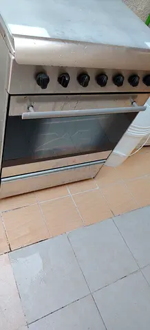 Used freestanding stainless steel gas oven with 6 burners - good working condition