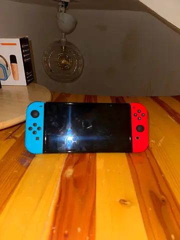 Nintendo Switch console with Joy-Con (red & blue) - used once