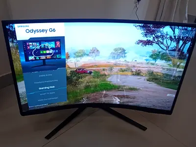 Samsung odyssey G6 32-inch curved smart gaming monitor featuring a QHD 2560x1440 resolution, a fast