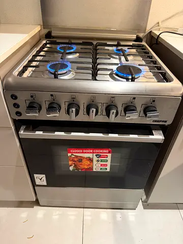 Gas Cooker with 4 Burners and Built-in Oven - Used, Good Condition     1 year exactly