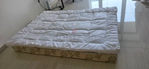 Used double mattress with topper - good condition. Topper dry-cleaned