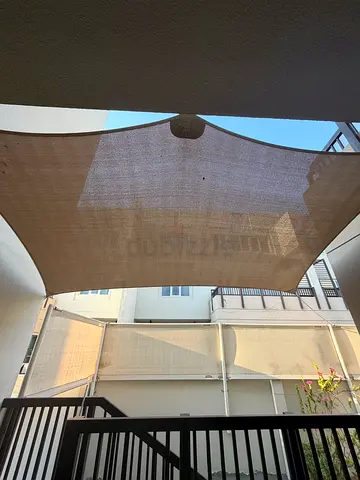 Large outdoor beige sun shade / privacy sail - good condition