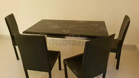 Table and chair for sale for just 150 aed