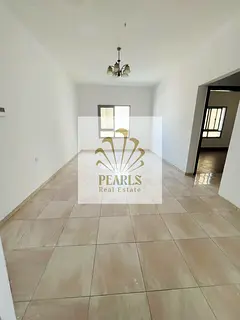2-bedroom apartment for rent in Al Rashidiya 1, Ajman, near Pearl Towers, with an open-view balcony 