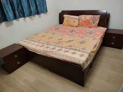 King size wooden bed frame with 2 x bedside table with mattress - good condition