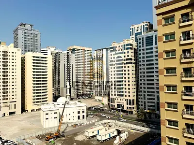Spacious apartment for residential| Parking Free| Master Bed Room| Maintenance free Easy Access To dubai | 6 cheque | Wardrobes |