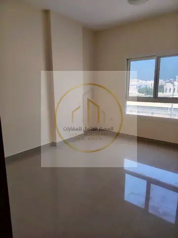 غرفتين وصالة بالناصرية الشارقة | غرفة ماستر | حمامات خاصة | شهر مجاني | باركينج وصيانة مجانًا