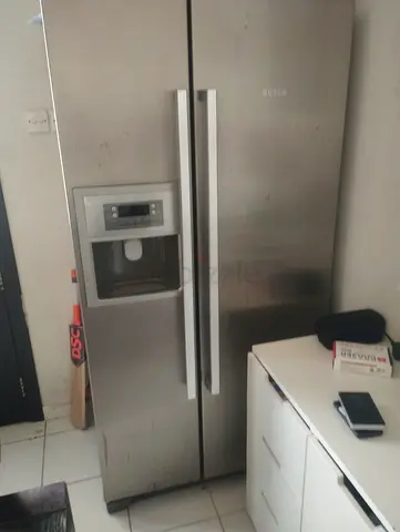 Bosch Side-by-Side Stainless Steel Refrigerator with Water/Ice Dispenser