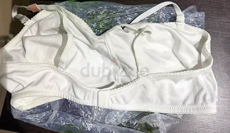 White women's bra - size tag visible, new with tags, size 38 D from Splash, good for Breastfeeding