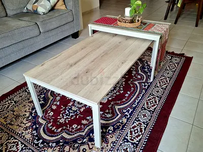 Pair of nesting coffee tables with light wood tops and white metal frames ( available by 5-7th Nov)
