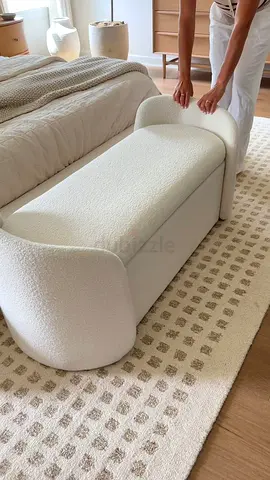 Cream boucle upholstered storage bench / ottoman