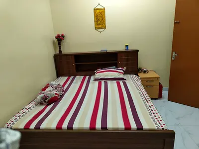 Wooden Double Bed with Headboard Storage - Good Condition