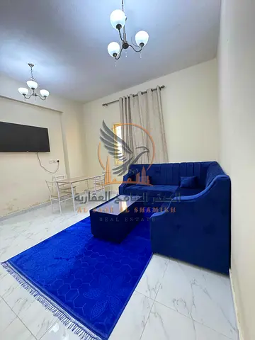 Lowest-priced furnished 1-bedroom apartment with living room for monthly rent in Ajman 2 bathrooms All utilities included Located near Grand Mal