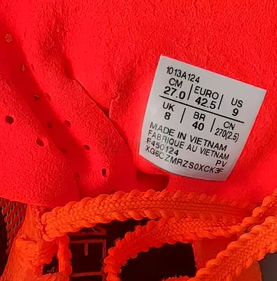 Used men's running shoes - size EU 42.5 / US 9 (red/orange)