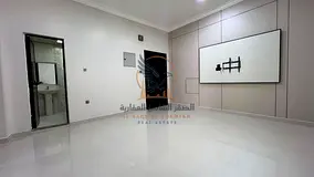 Two-bedroom apartment with a living room and balcony, first occupancy, super deluxe finishing, in Aj