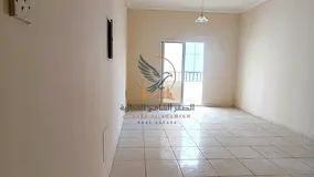 Premium 1BR apartment for annual rent with central AC balcony spacious layout prime location easy ro