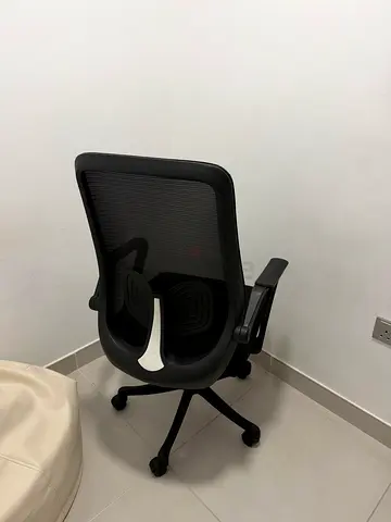 Ergonomic black mesh office chair with lumbar support