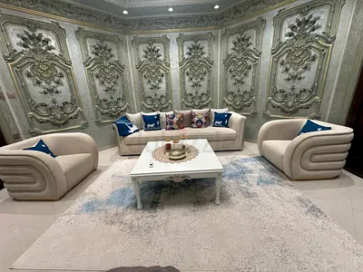 3-piece cream sofa set with matching armchairs and rug plus table