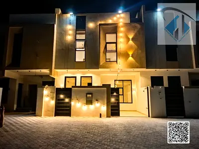 Villa for sale in Al Helio 1, Ajman, featuring 4 master bedrooms and a roof terrace; price includes all fees.