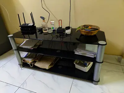Black glass TV stand / entertainment center with 3 tiers