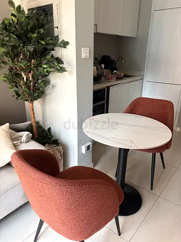 Bouclé dining chairs (set of 2)
Terracotta bouclé, black metal legs. Bought this year, like new.