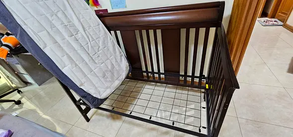 Dark wood convertible baby Crib. Giggles. Used only few times