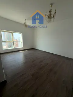 3BR apartment in Al Rand Tower, Sharjah. 2,000 sq ft, 4 bathrooms, maid's room, parking & sea view. 