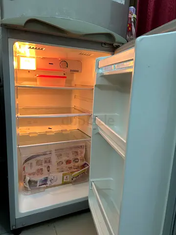 Small single-door refrigerator in good working condition Down portion not working only