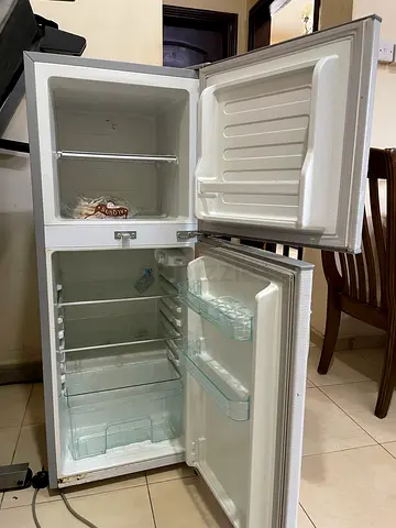 Used Double-door refrigerator with top freezer - good working condition