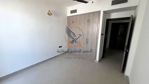 One-bedroom apartment with a living room and balcony, first occupancy, super deluxe finishing, excellent spaces, in Ajman next to the Saudi German
