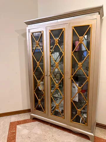 Sleek design cupboard for dining dishes ( comes with two built in LED lights )
