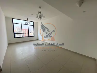 2-bedroom apartment with a living room for rent on Al Ittihad Street, Ajman | One month free and a private parking space