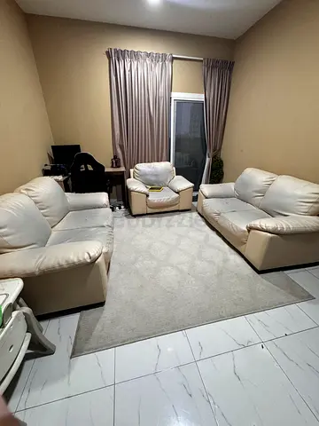 Cream leather 3-piece living room sofa set with armchair