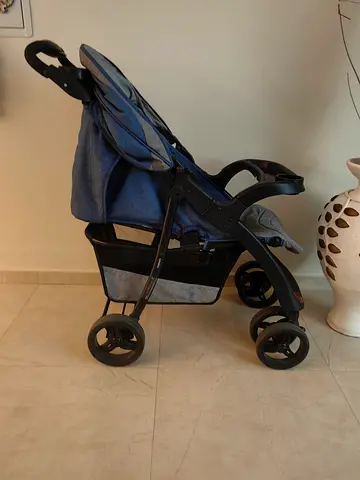 Lightweight Standard Baby Stroller in Blue, Maxim, one front wheel is broken