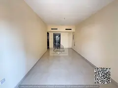 One-bedroom apartment with a living room, built-in wardrobe, balcony, and central air conditioning.