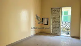 Two rooms and a living area with a balcony, located in Industrial Area 2 behind Emirates Markets.
